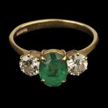 * Emerald Ring. An 18ct gold emerald and diamond ring