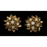 * Earrings. A modern pair of 18ct gold and diamond clip-on earrings