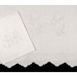 * Bed Linen. A monogrammed French linen sheet, early 20th century, & 12 napkins
