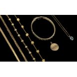 * Gold Jewellery. An 18ct gold bracelet and other items