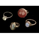 * Dress Rings. A 15ct gold opal ring and other
