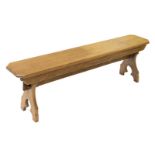 * Arts and Crafts. An early 20th-century golden oak bench