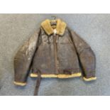 * Flying Jacket. A WWII RAF Irvin brown leather flying jacket
