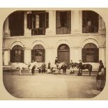 * China. Horses and riders with Chinese attendants in front of a shuttered stone house, c. 1870s