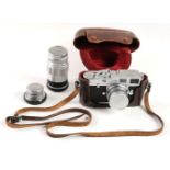 * Leica M2 rangefinder camera with three lenses, MR lightmeter and other accessories