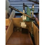 * Bookbinding equipment. A collection of equipment including drill stand blocking press