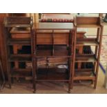 Bookcase. A pair of 1920s shaped oak bookcases