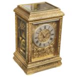 Carriage Clock. A Victorian brass carriage clock by Elkington & Co