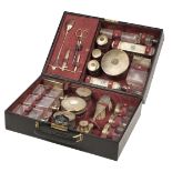 Vanity Set. An art deco silver travelling composed set