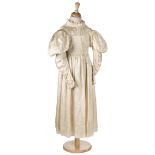 Clothing. A girl's silk dress, circa 1910, & other items