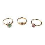 Rings. An 18ct gold cluster ring and two further 18ct gold rings