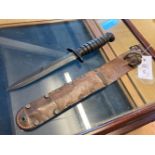 Fighting Knife. A WWII American M3 Imperial fighting knife dated 1943,