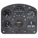 Cockpit Instruments. An aircraft instrument panel and other items