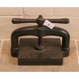 Book press. A cast iron book press