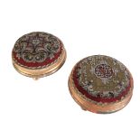A MATCHED PAIR OF VICTORIAN GILTWOOD FRAMED FOOTSTOOLS