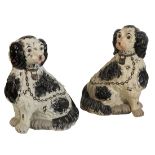 A PAIR OF LARGE STAFFORDSHIRE TYPE POTTERY SPANIELS