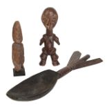 A CENTRAL AFRICAN CARVED WOOD FIGURE