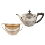 A 20TH CENTURY MATCHED SILVER TEAPOT AND SUGAR BOWL