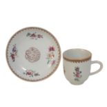 A CHINESE EXPORT ARMORIAL COFFEE CUP AND SAUCER