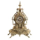 A FRENCH BRASS CASED MANTLE CLOCK