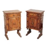 A PAIR OF TUSCAN WALNUT SMALL CUPBOARDS