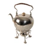 A SILVER TEAPOT ON STAND