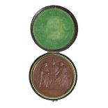 A 19TH CENTURY BRONZE MEDAL OF NAPOLEAN III