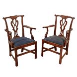 A PAIR OF COUNTRY CHIPPENDALE STYLE ELBOW CHAIRS