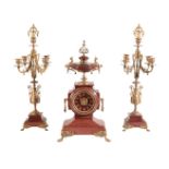 A FRENCH MARBLE & BRASS CLOCK GARNITURE