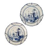 A PAIR OF 18TH CENTURY CREAMWARE BLUE AND WHITE PLATES