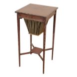 A GEORGE III STYLE MAHOGANY SEWING TABLE