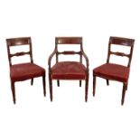 A SET OF SEVEN LATE REGENCY MAHOGANY DINING CHAIRS