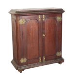 A CONTINENTAL OAK CABINET