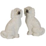 A PAIR OF LARGE VICTORIAN STAFFORDSHIRE POTTERY DOGS