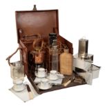 AN EDWARDIAN FOUR PERSON PICNIC SET