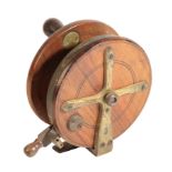 A RARE EARLY WOODEN BRASS STAR-BACK SEA FISHING REEL