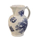A BLUE AND WHITE MASK JUG,