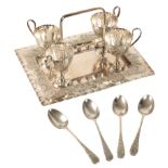 A SILVER PLATED EGG CUP AND STAND