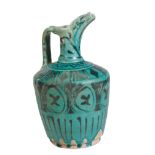 A PERSIAN TURQUOISE POTTERY EWER, POSSIBLY 12TH/13TH CENTURY