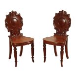 A PAIR OF VICTORIAN OAK HALL CHAIRS