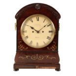 A 19TH CENTURY FLAME MAHOGANY BRACKET CLOCK