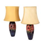 A PAIR OF MOORCROFT VASE LAMPS