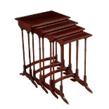 AN EDWARDIAN MAHOGANY NEST OF FOUR TABLES