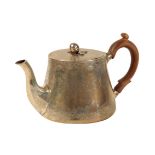 A SILVER TEAPOT