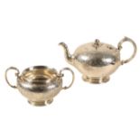 A SILVER TEAPOT AND SUAGR BOWL