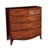A REGENCY BOWFRONT CHEST OF DRAWERS