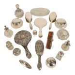 A COLLECTION OF SILVER MOUNTED DRESSING ITEMS