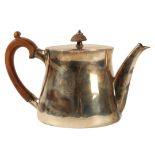 A 20TH CENTURY SILVER TEAPOT