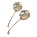 A PAIR OF SILVER SERVING SPOONS,