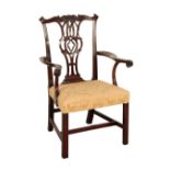 A GEORGE III MAHOGANY CHIPPENDALE STYLE ARM CHAIR